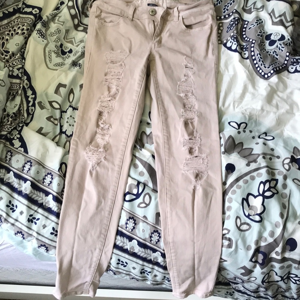 Pink ripped jeans